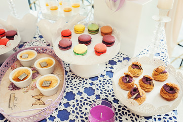 Macaroons Biscuits On White Stand.