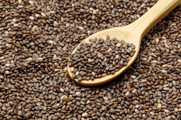 Chia seeds with wooden spoon