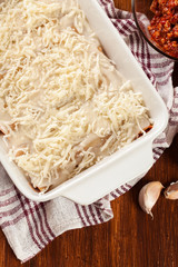 Cannelloni stuffed with meat cooked in a casserole dish ready fo