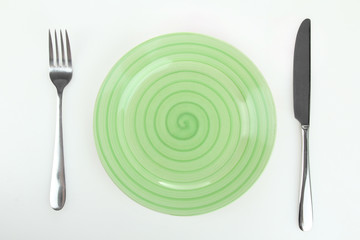  plate with a picture of flowers and a knife with a fork