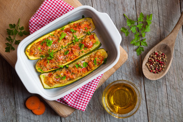 Zucchini stuffed with meat and vegetables