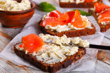 rye bread toasts with cream cheese and salmon
