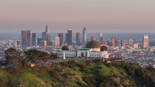 Griffith Observatory and Downtown Los Angeles. Day To Night Transition Timelapse 