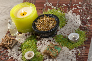 Obraz na płótnie Canvas Spa nature products. Sea salt, chamomile, soap and aromatic oil