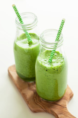 healthy green spinach smoothie with cilantro lime banana ginger