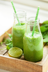 healthy green spinach smoothie with cilantro lime banana ginger