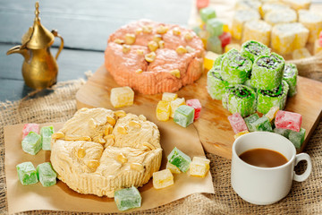 traditional eastern desserts on wooden background