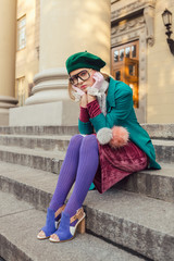 Fashion shot of college student girl at campus outdoors