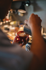 Cappuccino milk foam in the making.