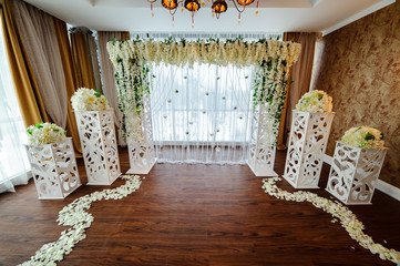 Beautiful white wedding Arch of flowers