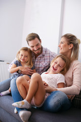 Family with two daughters.