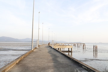 Walk way with electricity to sea.