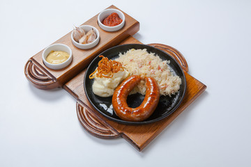 grilled sausages, and potatoes on cooking pan