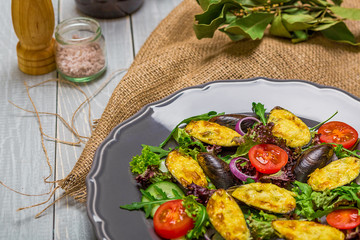 Fresh vegetable salad, healthy food, organic cucumbers,
mussels, tomatoes and salad leaves
