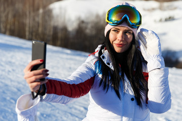 Girl doing selfie on winter