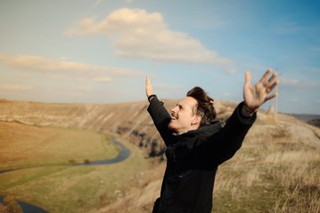 Happy handsome  man outdoors portrait
