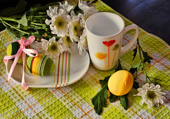 Easter composition. Dyed eggs with a branch of chrysanthemum. A good mood. Easter Festival
