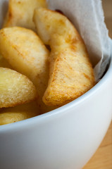 Bowl of Cooked Chips with Paper Napkin