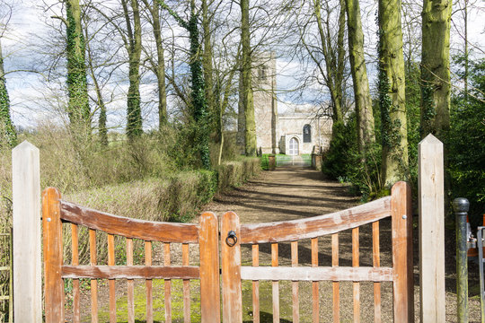 Entrance To A Country House In The Countryside, Long Driveway Big Wooden Gates, UK