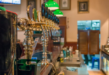 Brewery machine beer tap pouring