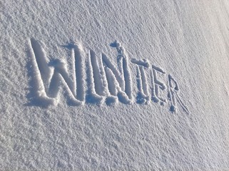Winter Inscription Snow. Handwritten in the snow surface.