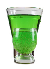 Glass cup with a cocktail on white background