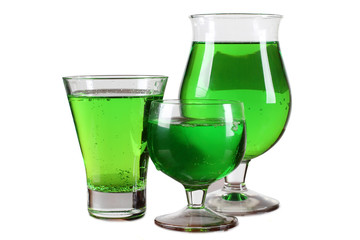Glass cup with a cocktail on white background