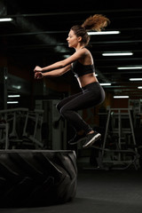 Fototapeta na wymiar Beautiful strong sports lady make sport exercises
