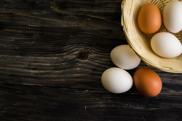 Chicken eggs on a wooden table. Natural product.