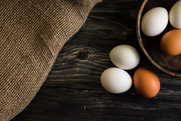 Chicken eggs on a wooden table. Natural product.
