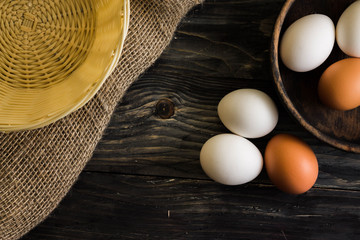 Chicken eggs on a wooden table. Natural product.