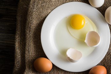 Chicken eggs on a wooden table. Natural product.