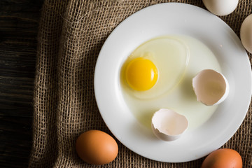 Chicken eggs on a wooden table. Natural product.