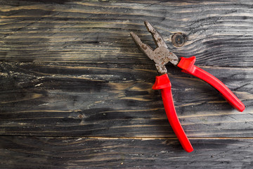 Hand tools on a wooden table in rustic style