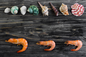 Shrimps on a wooden table in rustic style
