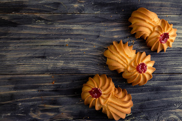 Cookies kurabe, on a wooden table in a rustic style.