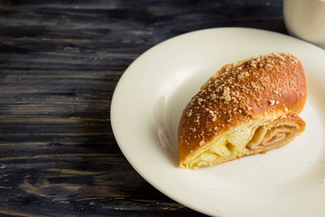 Austrian strudel with lemon and orange jam on a wooden table in rustic style