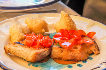 bruschette and seaweeds fritters