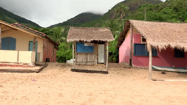 Small shack cabin at the beach shore. Home nature base. Wooden shack by a beach on a tropical island