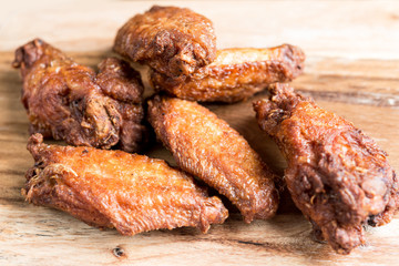delicious fried chicken wings with sauce