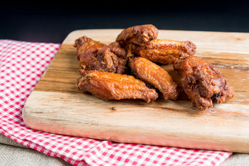 delicious fried chicken wings with sauce