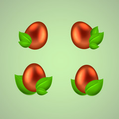 Set of orange glossy eggs in green leaves