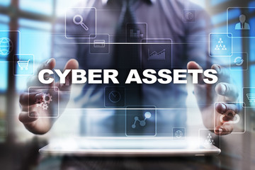 Businessman using tablet pc and selecting cyber assets.