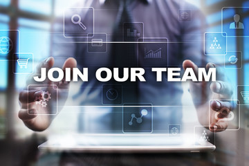 Businessman using tablet pc and selecting join our team.