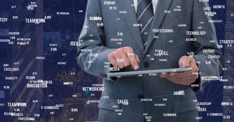 Man with tablet against Night city with connectors