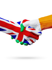 Flags United Kingdom, Ireland countries, partnership friendship handshake concept.