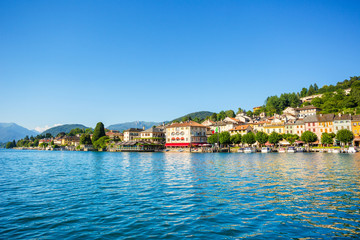 Fototapeta na wymiar View of Motta square on Orta San Giulio from a touristic boat, Lake Orta, Piedmont, Italy