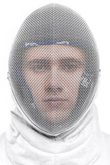 Close-up view of young man professional fencer wearing helmet