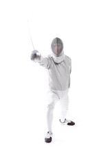 concentrated fencer in uniform training with rapier in hand on white