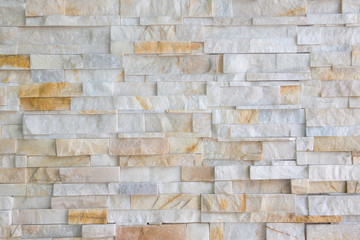 Pattern of grey and rough sandstone wall texture and backgroundม stone Cladding wall